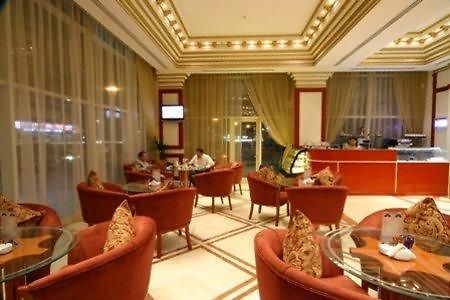 Emirates Palace Hotel Suites Sharjah Restaurant billede